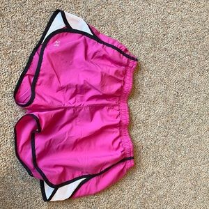 Pink Under Armour running shorts